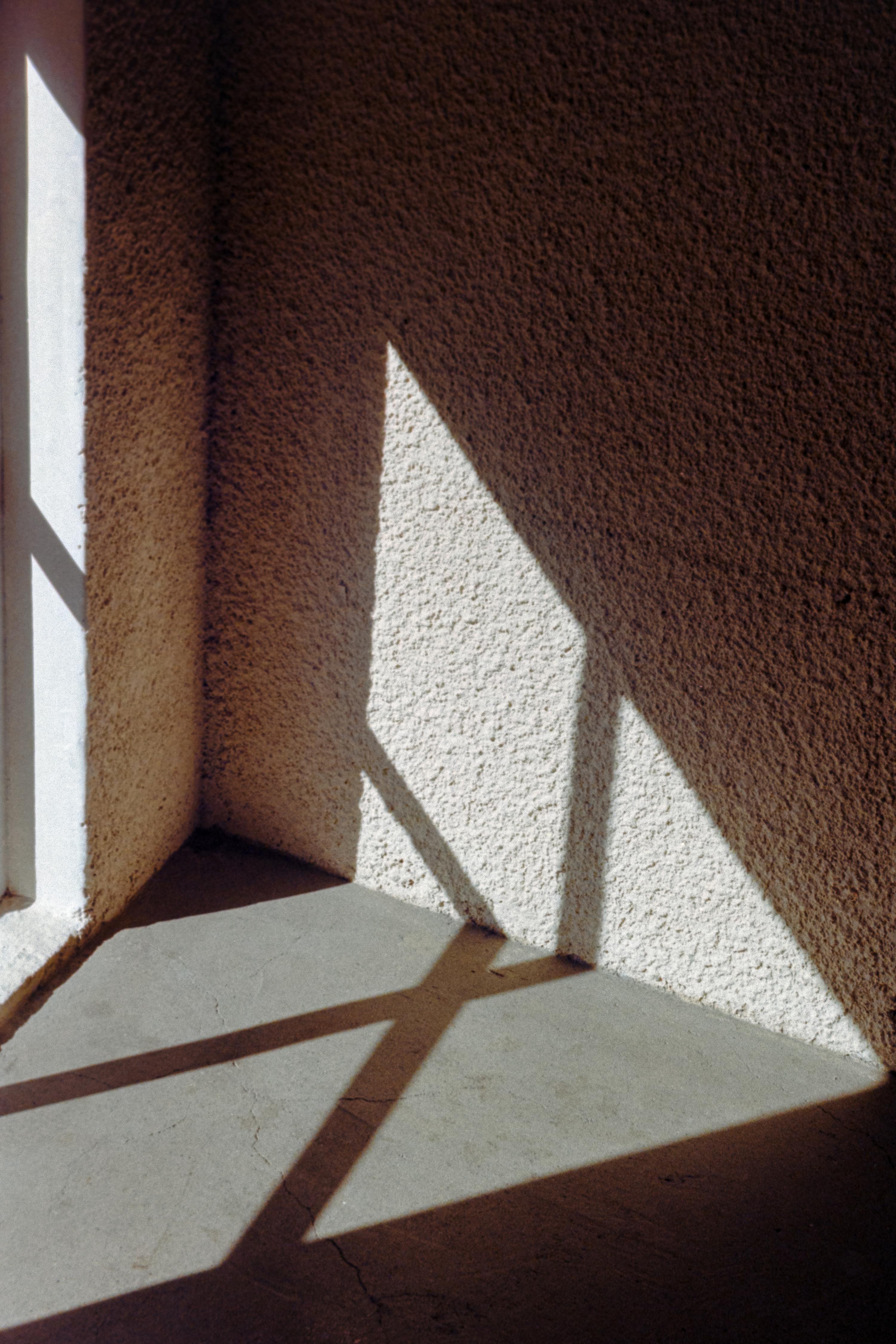 Photo of light through a small window 