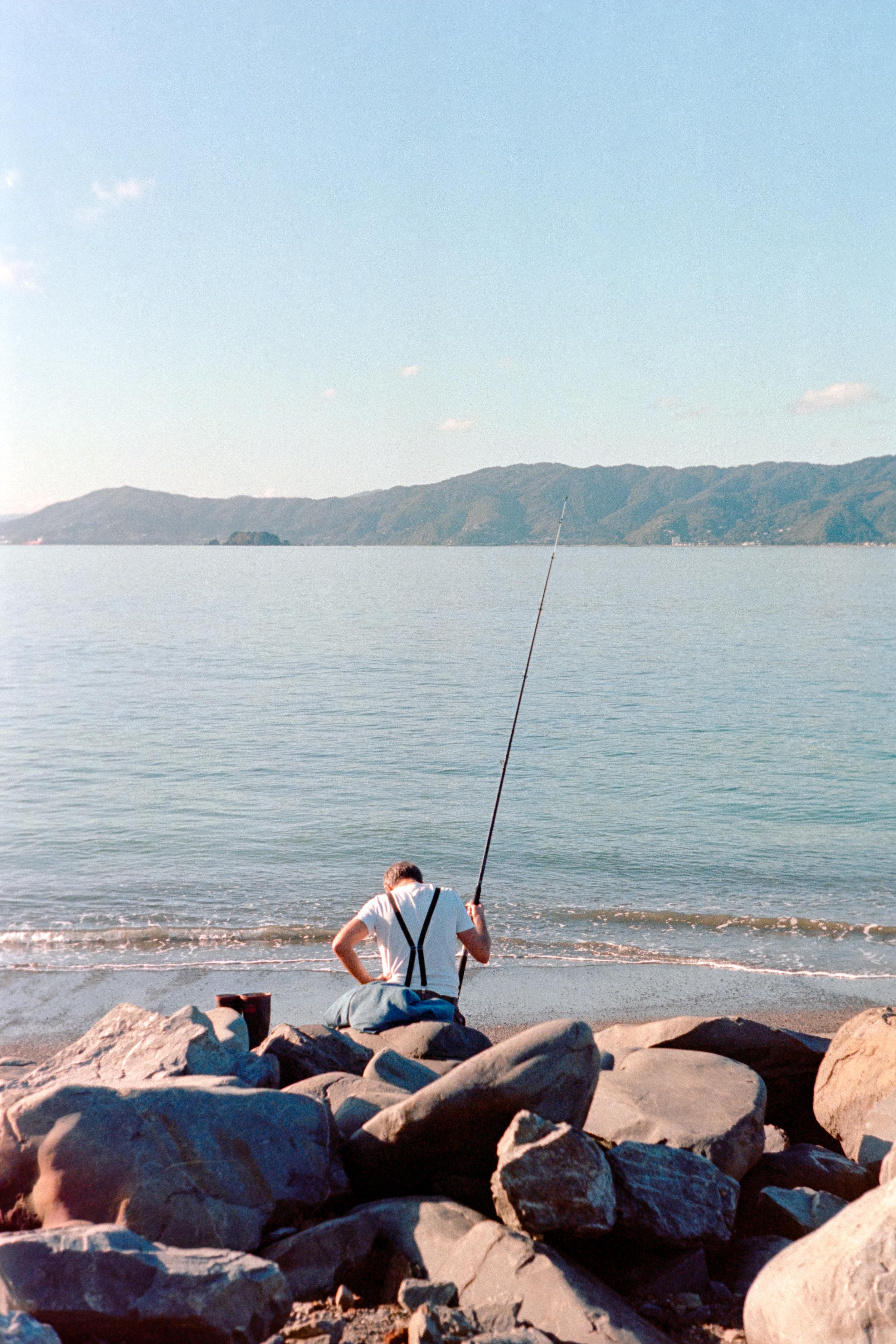 Photo of a man fishing 