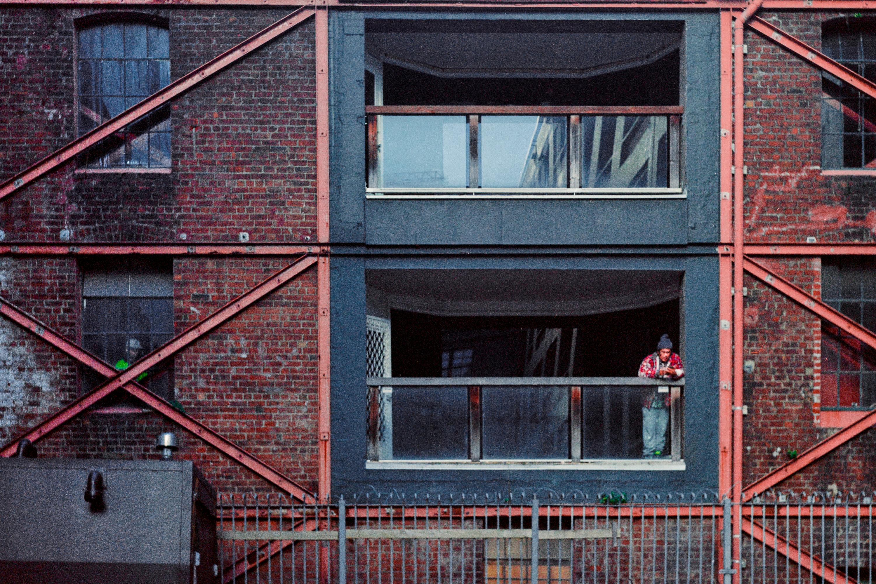 Photo of a building with workers in it