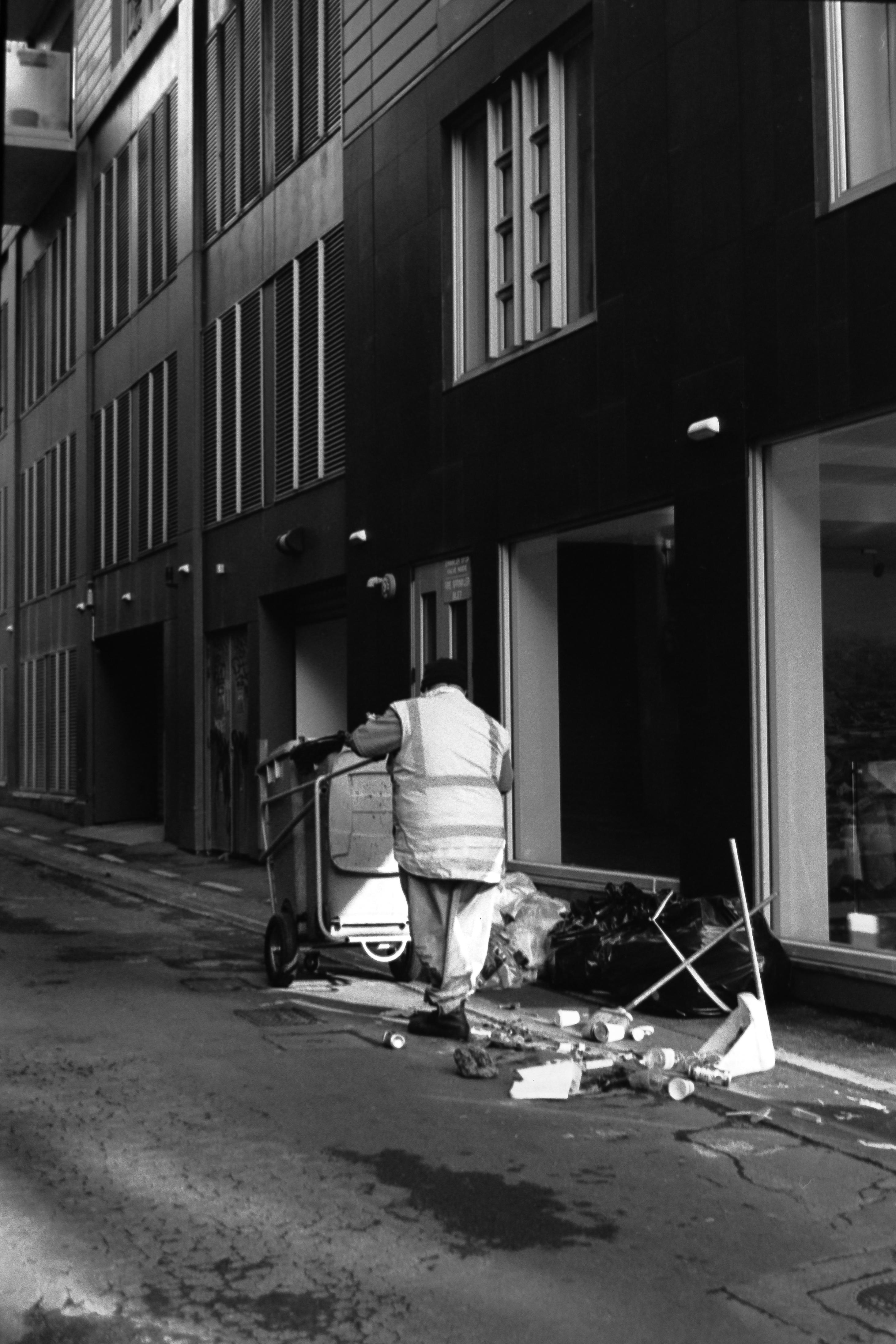 Photo of a rubbish man doing his rounds 