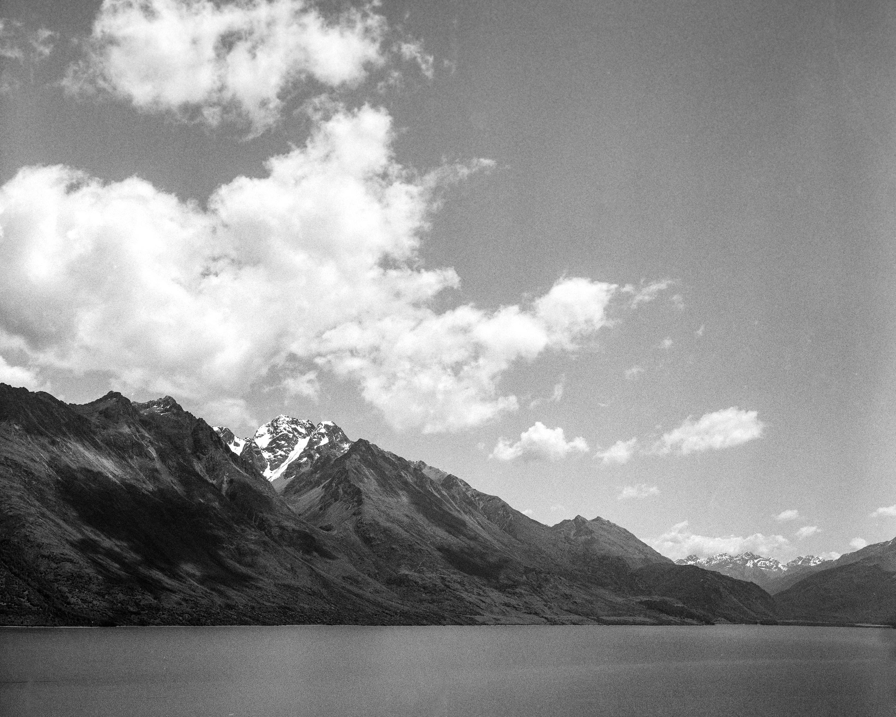 Photo of mountains on a lake 